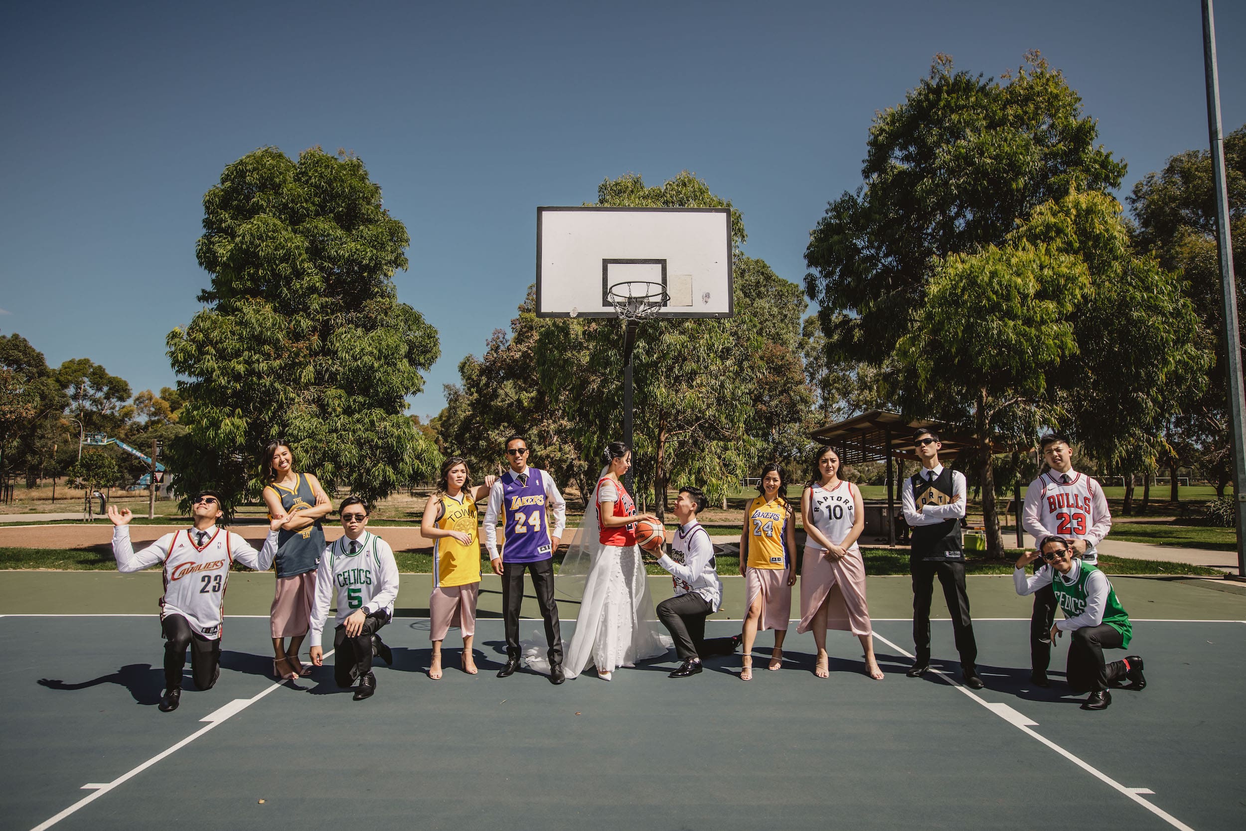 Calèche Real Bride Anita & Terence - bridal party on basketball court