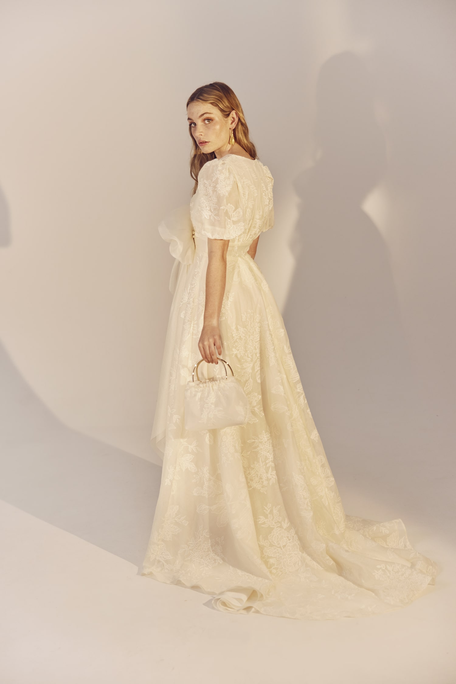 Rosa - an embroidered silk/cotton and pineapple organza gown with a large raw bow
