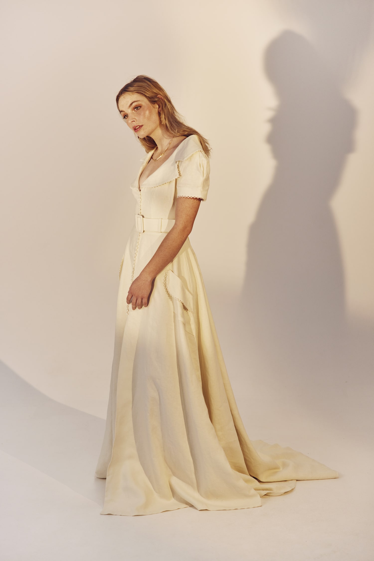 Valerie full length side view - linen A-line gown with a wide collar