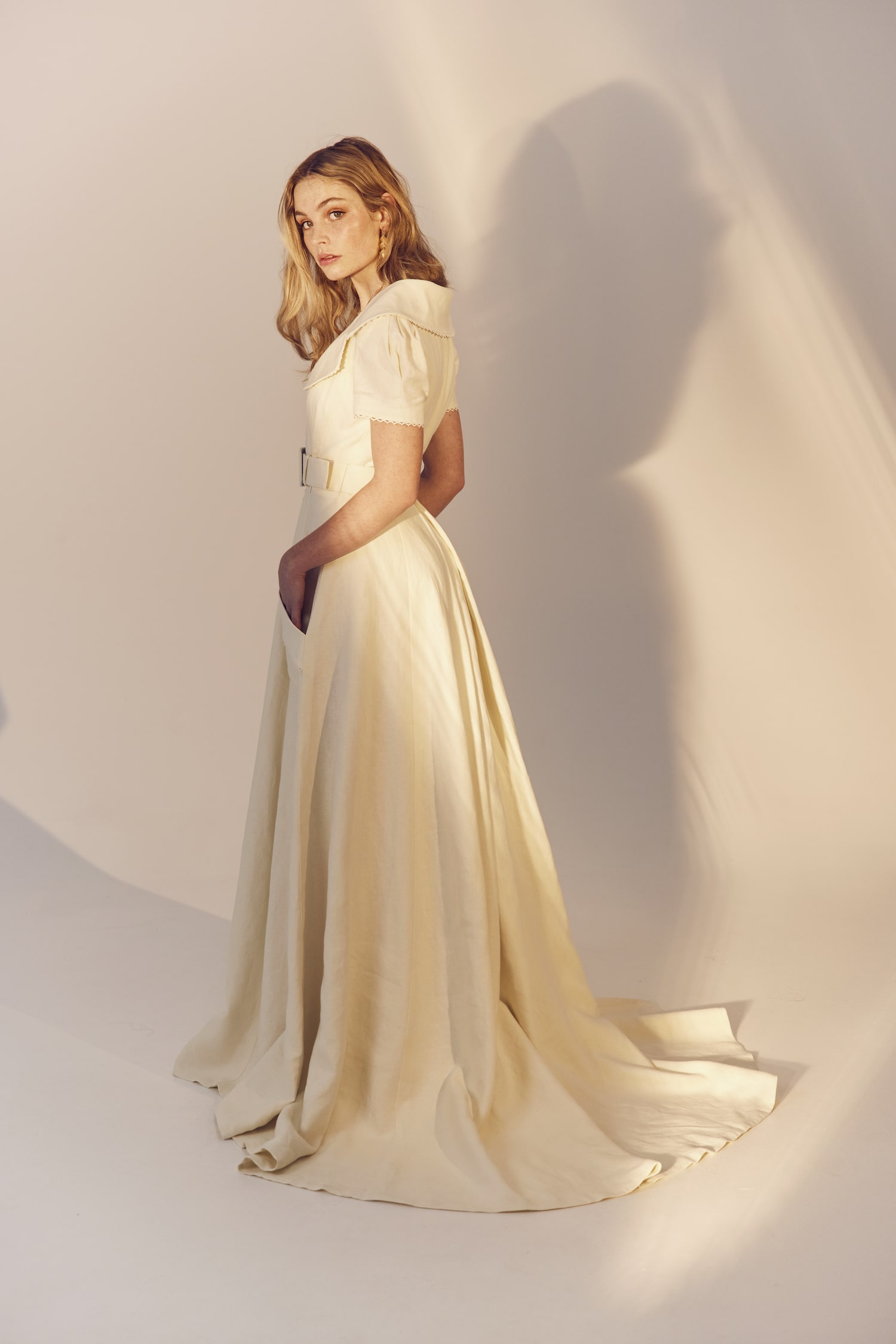 Valerie full length side view - linen A-line gown with a wide collar