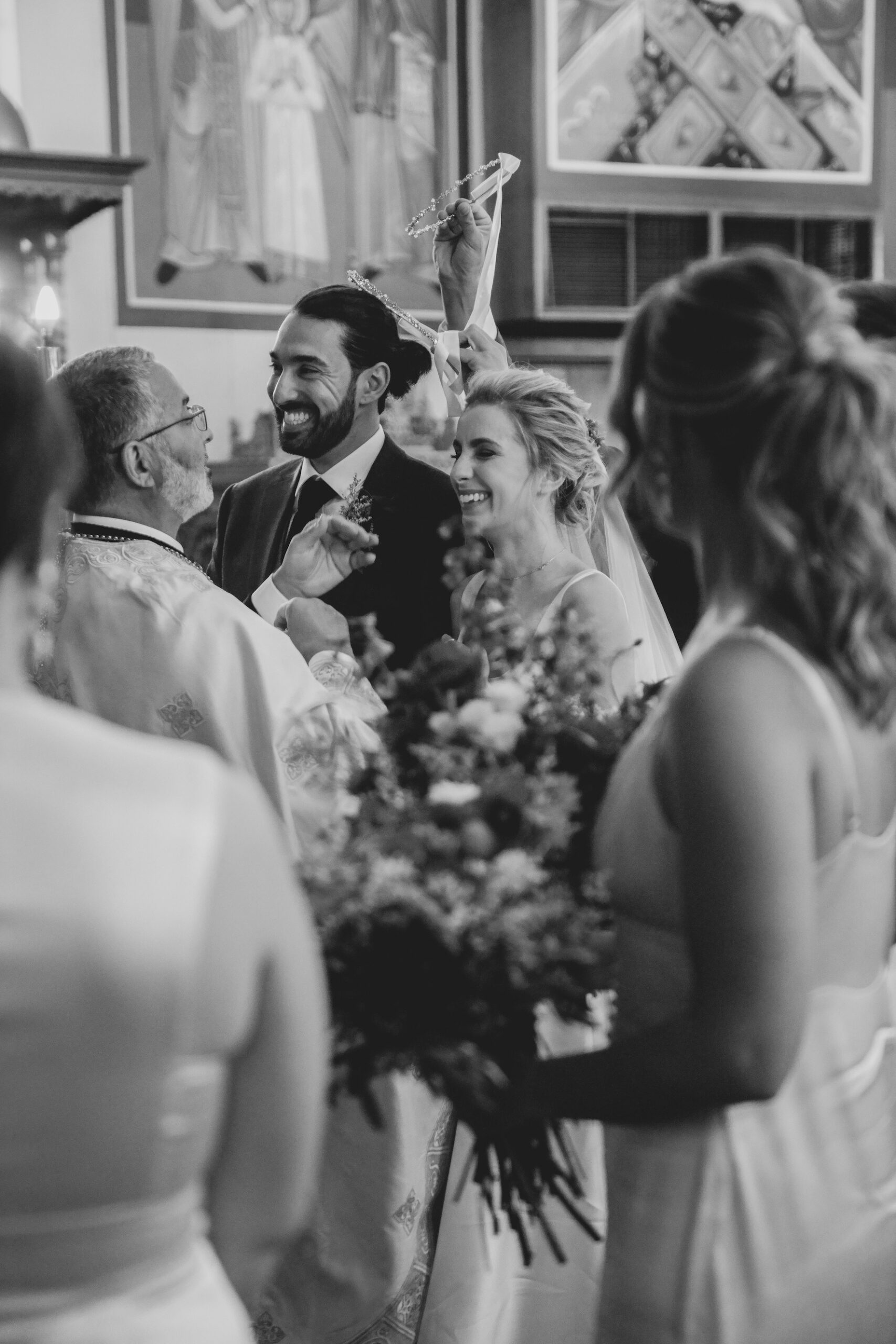 Black and white shot of Maia and Andrew during the ceremony