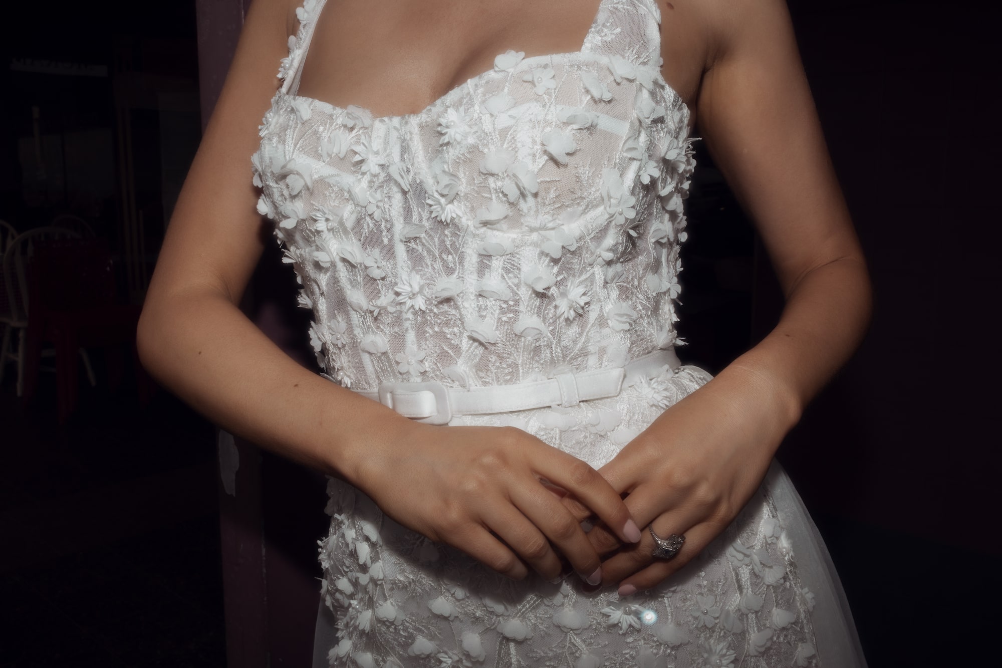 Close up of 3D lace detail on bodice.