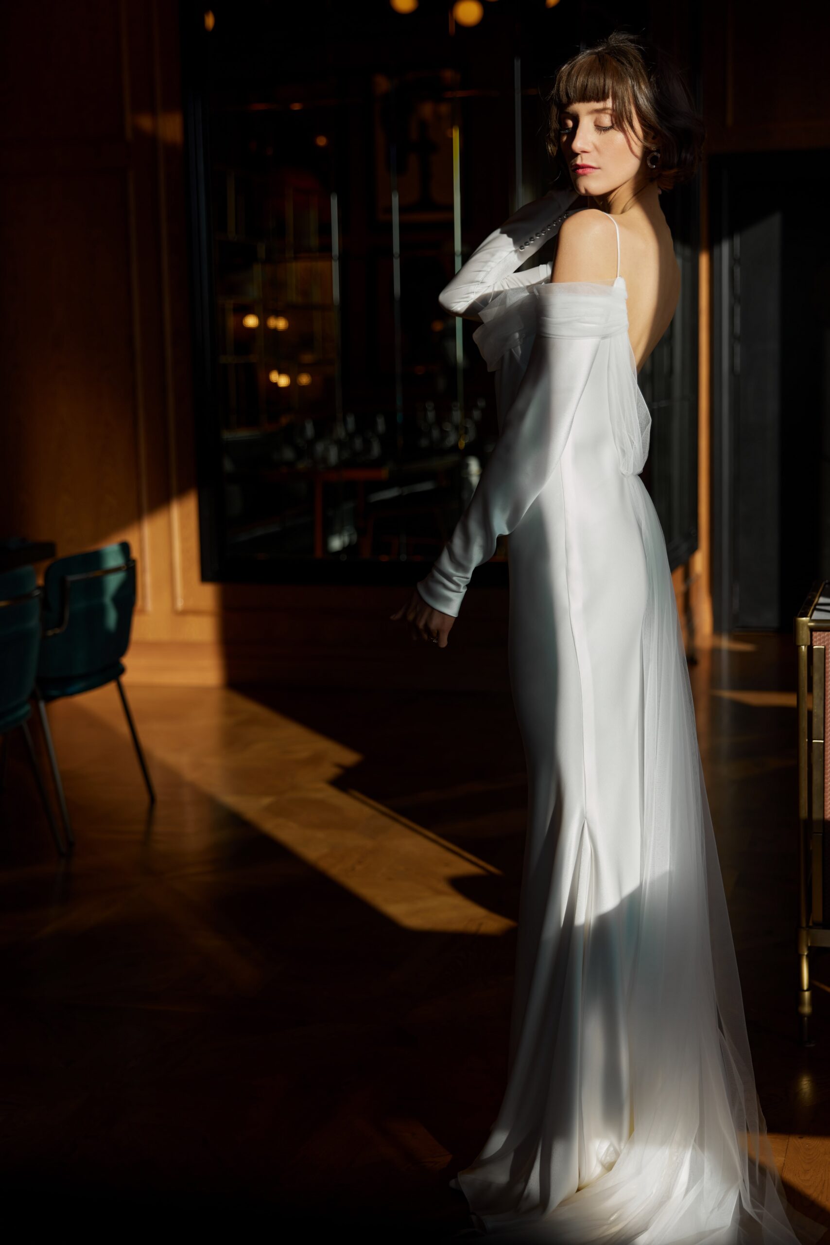 Juliette - a slinky bias cut satin gown with a soft rouched tulle neck and shoulder collar and detachable satin sleeves.