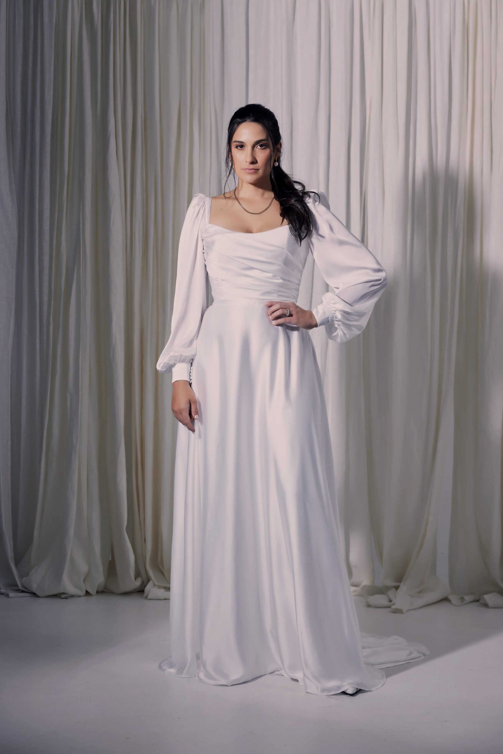 The Lunetta gown - recycled satin chiffon with a softly draped bodice, a-line skirt and bishop sleeves.