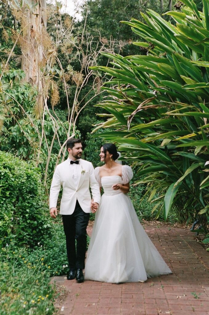 Maddy and Jason walking through the botanical gardens