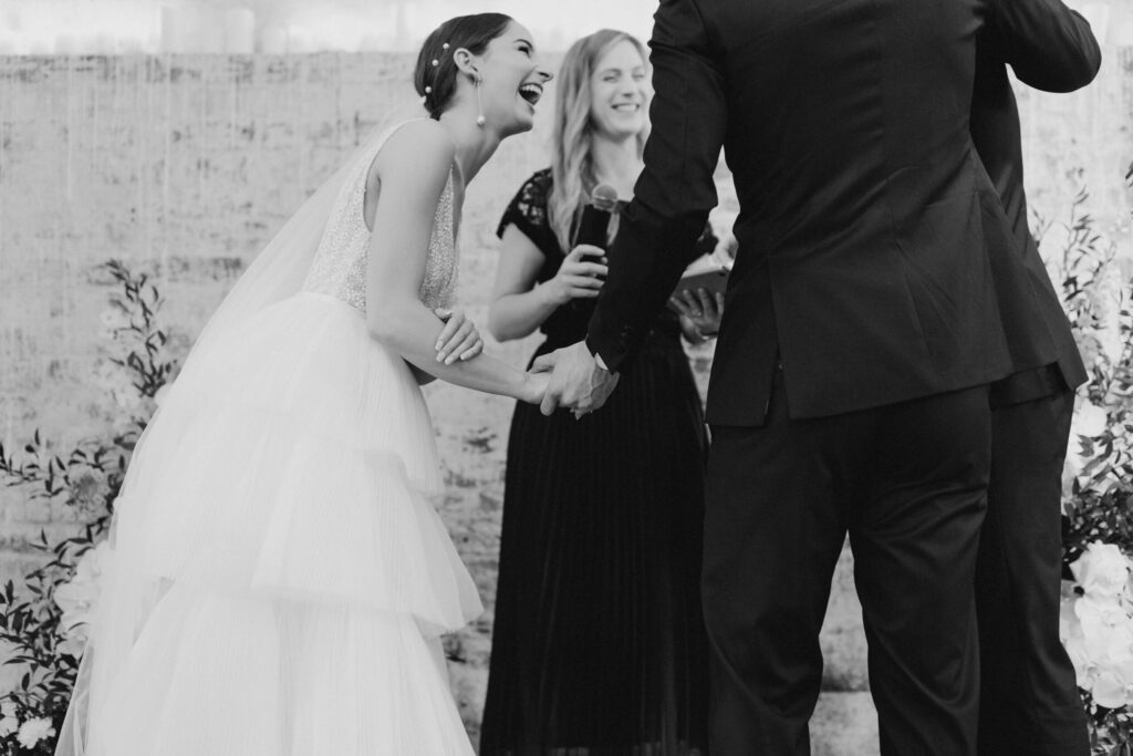 Bethany and Daniel sharing a laugh during the ceremony