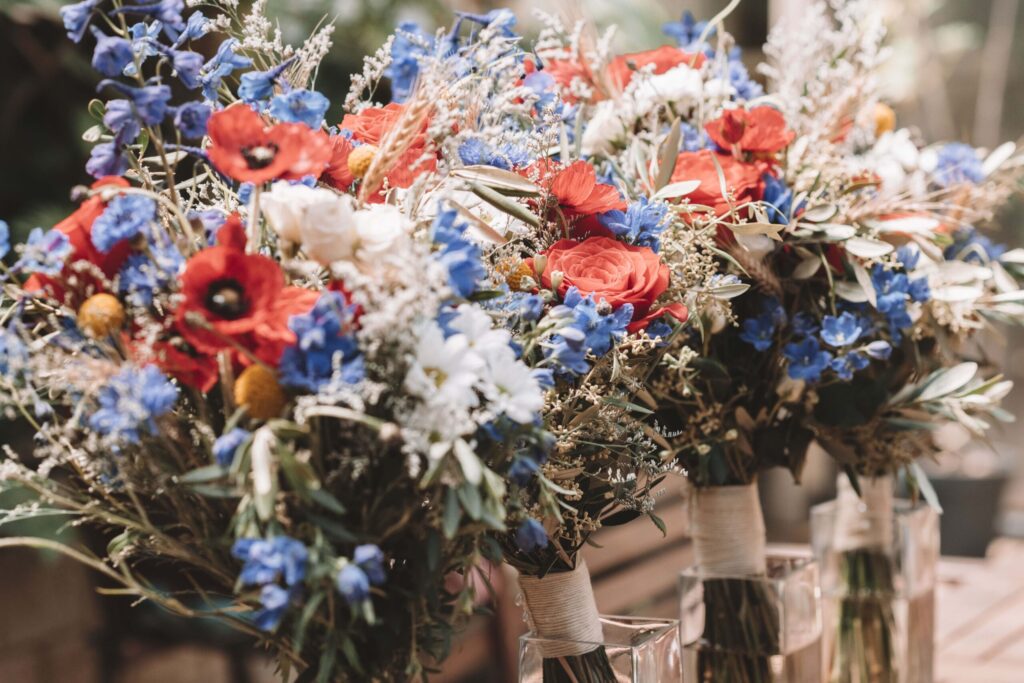 Red, white, blue and green floral bouquets