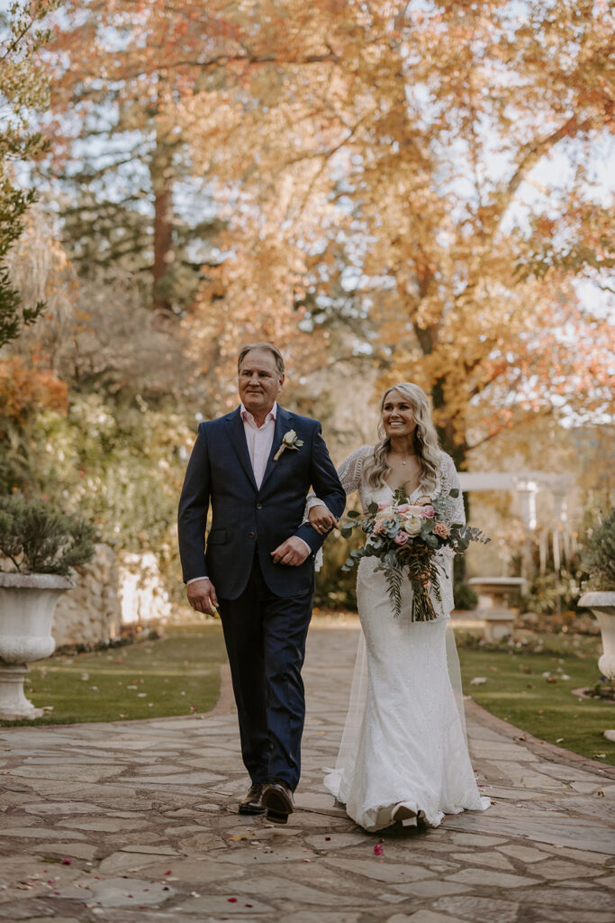 Jordan & dad walking down the aisle